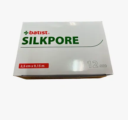 Pevná fixační náplast z umělého hedvábí Silk, bílá, cívka, 2,5 x 9,15